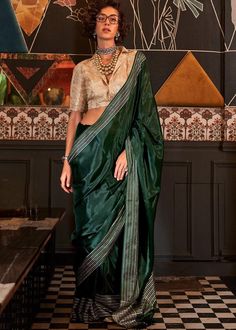 Embrace elegance and sophistication with our Viscose Satin Handloom Saree. Crafted with meticulous attention to detail, this saree features a luxurious satin finish that drapes beautifully, offering a silky-smooth texture. The deep Green hue exudes timeless charm and versatility, making it perfect for Party and festive celebrations. Elevate your wardrobe with this stunning piece that combines classic beauty with modern grace --------------------------------- S A R E E ● D E T A I L S ----------- Green Weaving, Drapping Saree, Cream Silk Blouse, Patiala Salwar, Cream Blouse, Half Sleeve Blouse, Green Saree, Party Kleidung, Stylish Sarees