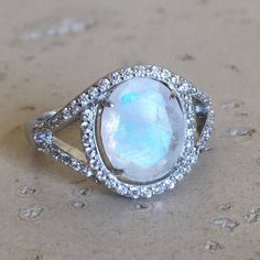 image 0 Bohemian Oval Jewelry With Accent Stones, Oval Moonstone Promise Ring In Fine Jewelry Style, Bohemian Oval Opal Ring For Anniversary, Bohemian Oval Jewelry For Wedding, Bohemian Oval Wedding Jewelry, Mystical Oval Jewelry For Weddings, Ethereal Oval Moonstone Jewelry, Mystical Oval Jewelry For Wedding, Bohemian Moonstone Ring With Gemstone Accents