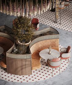 the circular table is surrounded by chairs and tables with plants growing out of each one