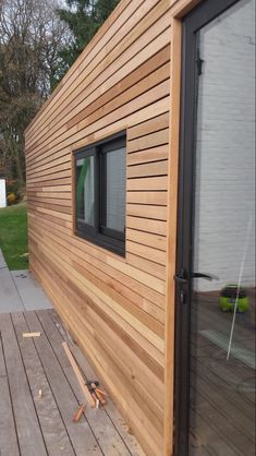 the side of a house that is made out of wood