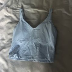 Lululemon Chambray Light Blue Align Tank! Size 6! So Cute Just Too Big On Me:(. Never Worn, Perfect Condition! Blue Align Tank, Align Tank, Lululemon Align Tank, Lululemon Tank Top, White Halter Maxi Dress, Lululemon Tank, People Shopping, Vintage Skirt, Chambray