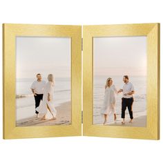 an open photo frame with two people standing on the beach