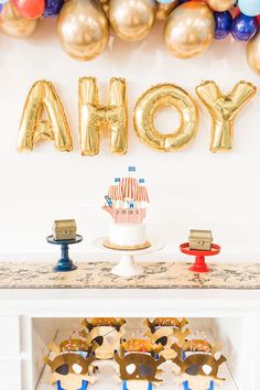 a birthday party with balloons and decorations