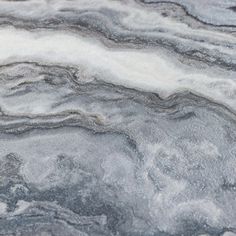 an abstract marble pattern with white and gray colors on the top, bottom and bottom