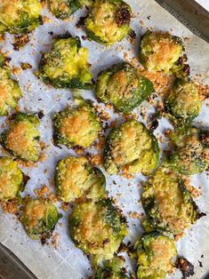 cooked brussel sprouts with parmesan cheese and seasoning on top