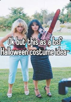 two women standing next to each other holding a chainsaw