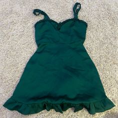 Size Extra Small. Never Worn Brand New Just Took The Tags Off Forest Green Dress Formal Short, Green Dress Formal Short, Green Mini Dress With Sweetheart Neckline And Ruffles, Vacation Mini Dress With Sweetheart Neckline, Casual Sundress With Sweetheart Neckline And Lining, Casual Sundress With Sweetheart Neckline For Date Night, Casual Mini Dress With Sweetheart Neckline For Date Night, Cute Green V-neck Dress, Casual Ruffle Dress With Sweetheart Neckline