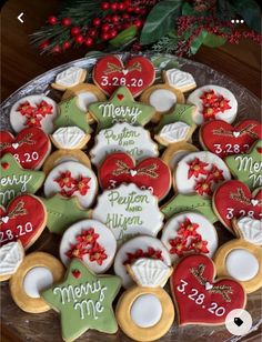 decorated cookies are arranged on a platter