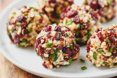 several balls of food on a white plate