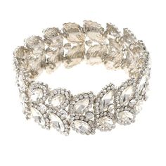 Silver Tone Metal Rhinestone Stretch Bracelet / Size: 1" H / Lead & Nickle Compliant / Color: Silver & Clear Condition: Brand New SKU:  ESB3048-SCL Color: Clear Design: All orders will ship from USA via UPS or USPS. We expect all local orders will receive the items within 7 business days or less depend the location. Worry free international shipment delay or custom duty fee. Glamorous Silver Crystal Bracelet With Rhinestones, Silver Jeweled Crystal Bracelet For Party, Silver Crystal Bracelet With Jewels For Party, Glamorous Crystal Bracelet With Rhinestones, Glamorous Crystal Bracelets With Rhinestones, Elegant Adjustable Crystal Stretch Bracelet, Glamorous Silver Crystal Bracelets, Glamorous Silver Jeweled Crystal Bracelet, Metal Crystal Bracelet With Stones For Party