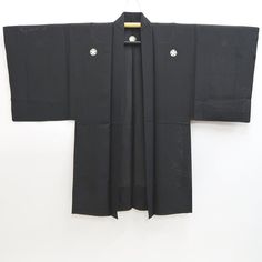 This is a pre-owned authentic Japanese kimono garment. This is a very striking genuine Japanese Vintage Silk Men's Haori. The fabric is a lightweight Silk, smooth-textured with a slightly lustrous finish. Step back in time with our vintage men's montsuki see-through haori. This traditional costume piece is not just cool, it's also a unique piece of history. Channel your inner expert and make a statement with this timeless and stylish haori. #1 Total Length : 98cm/38.6 inches #2 Center to the edg Traditional Black Kimono For Tea Ceremony, Black Long Sleeve Kimono For Tea Ceremony, Long Sleeve Black Kimono For Tea Ceremony, Traditional Black Cotton Kimono, Vintage Black Outerwear With Kimono Sleeves, History Channel, Japanese Vintage, Traditional Costume, Vintage Kimono