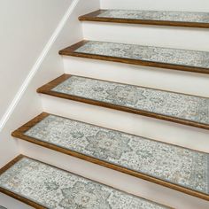 a set of stairs with carpet on them