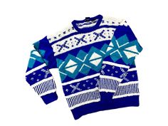 "This quintessential knit ski sweater will keep you warm whether you're on the slopes or cozy in front of the fireplace.  -100% Wool -Hand Knit -Gant \"The Rugger\" Made in Hong Kong  -Marked size M (check measurements below) -Abstract Snowflake pattern in jewel tones -Scoop neck -Long sleeves Measurements: Sleeve length (underarm to cuff): 22\" Total length (Collar to bottom, down back): 28\" Width across front (side seam to side seam): 23\" Condition: One small hole in underarm - can be easily Wool Snowflake, Abstract Snowflake, Ski Vintage, Ski Sweater, Vintage Wrapping Paper, Sweater Wool, Letter Gifts, Vintage Ski, Snowflake Pattern