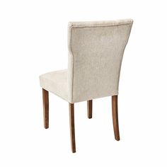 a beige upholstered chair with wooden legs and backrests on an isolated white background