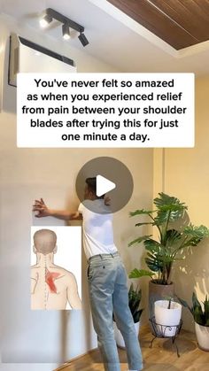 a man standing next to a wall with an ad on it that says you've never felt so amazed as when you experienced relief from pain between your shoulder and shoulder blades