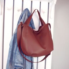 Made of vegan leather in beatiful shade of burgundy red, this large hobo tote for women can be your favorite daily use bag. Multifunctional - you can carry it in your hand, on the shoulder or as hippie crossbody purse. Universal - fits really well with any casual outfit. Large and roomy enough for all your stuff. Perfect for work, school, shopping and walk with children. It's durable, easy to pack and clean. Fastened with zipper. 100% handmade. DETAILS (shown): color: burgundy red pattern: 3in1 Trendy Burgundy Tote Shoulder Bag, Large Capacity Burgundy Satchel, Burgundy Hobo Bag With Large Capacity For Shopping, Burgundy Hobo Bag With Large Capacity For Travel, Burgundy Hobo Bag For Travel With Large Capacity, Large Capacity Burgundy Hobo Bag For Shopping, Burgundy Large Capacity Hobo Bag For Travel, Everyday Large Capacity Burgundy Hobo Bag, Burgundy Satchel With Large Capacity For Fall