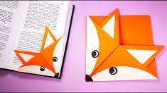 an origami book with a fox face on it