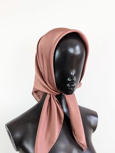 Dusky pink satin headscarf Luxury modern bohemian satin headscarf. This is made from a soft synthetic blend satin fabric. The fabric is luxurious and lightweight. This scarf is versatile and can be worn in many ways around the neck or head. It is large enough to be tied around the head to give full coverage, or to be draped around the neck.  This is a square scarf that can be folded to create the triangle look, or wrapped up and tied in a knot to be worn as a headband. Style: Head scarf Measurements:  Width: 28 inches (71 cm)  Length: 28 inches (71 cm)   Fabric: Non stretch satin  Colour: Pink Elegant Pink Bandana, Pink Satin Scarf For Summer, Elegant Pink Satin Scarves, Elegant Pink Satin Scarf, Chic Pink Satin Silk Scarf, Bandana Hair Wrap, Style Bandana, Mens Luxury Lifestyle, Bandana Hair