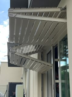 an awning on the outside of a building