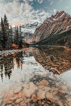 a mountain lake surrounded by rocks and trees