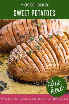 baked sweet potatoes on a baking sheet with text overlay saying hasselback sweet potatoes click here