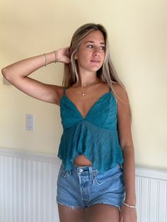 Blue Festival Top Blue Flirty Fitted Tops, Blue Fitted Flirty Top, Flirty Cropped Summer Tops, Summer Blue Cropped Crop Top, Blue Cropped Crop Top For Summer, Flirty Green Top For Party, Fitted Turquoise Tops For Spring, Blue Cropped Tank Top For Party, Trendy Blue Festival Top