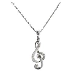 Diamond Music Note Necklace is made of 18k solid gold available in three colors of gold, White Gold / Rose Gold / Yellow Gold. Natural genuine round cut diamond each diamond is hand selected by me to ensure quality and set by a master setter in our studio. Diamond charm attached to a dainty gold chain it would be perfect to wear at almost any occasion and a perfect gift for a musician / guitarist / music lover friend. "ALL OUR ITEMS ARE ELIGIBLE FOR FREE SHIPPING AROUND THE WORLD" "AVAILABLE IN White Gold Heart Necklace, Diamond Music, Treble Clef Necklace, Xo Necklace, Music Note Necklace, Nota Musical, Necklace Hanger, Arrow Pendant, Musical Jewelry