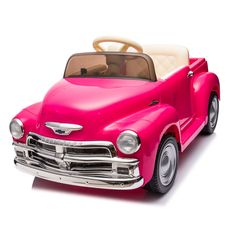 an old fashioned pink toy car on a white background with the driver in the front seat