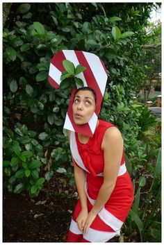 a woman wearing a red and white costume