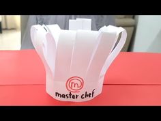 a paper bag sitting on top of a table with the word master chef printed on it