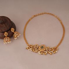 Elegant gold plated peacock necklace set  is made of brass alloy with gold plating. The necklace length is 18 inches, and the necklace lock is a hook.The earrings are 1.2 inch long, and its lock is a push-back.This set comes with beautiful pair of matching earrings Stunning antique gold finish multicolor stone maa Lakshmi pearl necklace set I Temple Jewellery earring is a show-stopping, traditional Indian necklace set with gold plating and handwork.NOTE: Elegant gold plated peacock necklace set is has been crafted by hand and may have slight irregularities or imperfections in color or embellishment. These irregularities are the result of human involvement in the process and add to the finished product's charm while ensuring you have a one-of-a-kind piece. Gold Sets Jewelry, Gold Sets Jewelry Indian Design, Gold Necklace Set Indian, Indian Gold Necklace Set, Indian Gold Necklace, Indian Necklace Set, Necklace Lock, Maa Lakshmi, Temple Jewellery Earrings