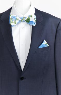 Hey babes! Does your boo need a new bow tie for your bestie's big day!? Well we have found the perfect accessory for him! The Josh Bow Tie is the OG formal look that does no man wrong! He is the life of the party and the best date in town! Whether he's a guest or a groomsmen, now you both can be in Mu when your watching an "I do!" This color was created to compliment our Cottage Floral Blue and other blue dresses, due to the varying fabrics, there may be slight shading discrepancies between the Pictures Of Groom, Dapper Bow Tie For Spring Weddings, Dapper Spring Bow Tie For Weddings, Dapper Spring Wedding Bow Tie, Semi-formal Blue Suit And Tie Accessories With Bow Tie, Men’s Shorts With Bow Ties Beach Wedding, Blue Bow Tie With Butterfly Knot For Formal Events, Floral Bow Tie Wedding Groomsmen, Navy Tux