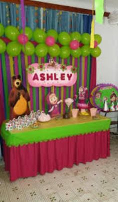 a birthday party with balloons and decorations