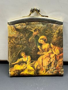 a purse with an image of people on it