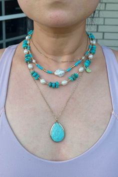 Elevate your style with our exquisite Turquoise Delight Layered Necklace Set, perfect for adding a touch of elegance to any outfit. This handcrafted set features a harmonious blend of turquoise beads, freshwater pearls, and delicate gold accents, creating a stunning statement piece that is both versatile and chic. **Why You'll Love This Necklace - **Unique Design Each freshwater pearl has its own shape and luster, making every necklace one-of-a-kind. - **Premium Materials High-quality pearls and Bohemian Turquoise Jewelry With Pearl Charm, Turquoise Pearl Jewelry With Pearl Charm, Turquoise Pearl Necklace With Natural Stones, Blue Bohemian Jewelry With Pearl Charm, Bohemian Blue Jewelry With Pearl Charm, Elegant Turquoise Pearl Jewelry With Pearl Charm, Turquoise Pearl Jewelry With Round Beads, Bohemian Turquoise Pearl Necklace, Adjustable Bohemian Turquoise Pearl Necklace