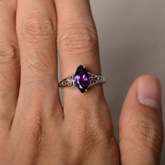 This is a gorgeous handmade creation. Its beauty is its simplicity & Elegance. The 6*12 mm marquise shape faceted natural amethyst is crafted in solid sterling silver and with rhodium plated. Main stone weight about 1.67 ct. All item is sent in a beautiful gift box If you have any idea of design your ring,pls contact me directly. You can realize more lovely stuff clicking the link https://www.etsy.com/shop/knightjewelry?refshopsection_shophome_leftnav Please leave the correct address and you Elegant Marquise Amethyst Jewelry, Formal Marquise Birthstone Ring, Marquise Amethyst Ring Gemstone Gift, Marquise Birthstone Ring In Fine Jewelry Style, Marquise Amethyst Ring Gift, Marquise Amethyst Ring As Gift, Fine Jewelry Marquise Rings As Gift, Fine Jewelry Marquise Rings For Gift, Marquise Diamond Ring Gift