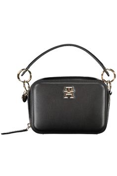 Elevate your accessory game with the sleek and sophisticated Tommy Hilfiger handbag. This versatile piece boasts a removable handle and chain shoulder strap, allowing you to switch up your style on-the-go. The bag features two compartments, a central pocket, and an internal card pocket—perfect for keeping your essentials organized. The striking contrasting details and prominent logo give this bag its distinctive Tommy flair, while the secure zip closure ensures your belongings stay safe. Tailore Tommy Hilfiger Crossbody Shoulder Bag For Travel, On-the-go Clutch Box Bag With Detachable Handle, Elegant Tommy Hilfiger Formal Bags, Elegant Formal Tommy Hilfiger Bags, Tommy Hilfiger Travel Crossbody Bag, Tommy Hilfiger Crossbody Travel Bag, Elegant Tommy Hilfiger Leather Shoulder Bag, Classic Tommy Hilfiger Everyday Bag, Tommy Hilfiger Rectangular Travel Shoulder Bag