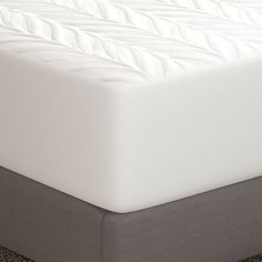 the mattress is made up and ready for someone to use it in their home or office