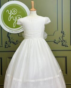 A romantic but traditional first communion gown for girls made with English muslin in a natural white, it has embroidered polka dots and stunning lace details throughout with some rows of punto Paris. The dress has buttons on the back for closure and a bow. Dry clean Does not include crinoline Made in Spain Final sale, no exchanges nor returns are available White First Communion Dress With Fitted Bodice, Classic Lace Bodice Dress For First Communion, First Communion Dress With Ruffles And Fitted Bodice, White Lace Trim First Communion Dress For Confirmation, Tulle First Communion Dress With Lace Trim, White Organza First Communion Dress With Lace Bodice, Organza Confirmation Dress With Lace Trim, White Classic Dress For First Communion, Organza Lace Trim Dress For Confirmation