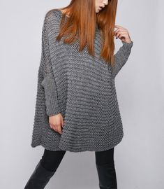 This beautiful over-sized sweater features simple style with fitted sleeves that makes you stylish and on trend. It is made of 100% eco cotton yarn in a beautiful charcoal/ dark grey color. No itch at all! It is a perfect item for Fall/winter that you can layering with tunic or shirt. Size: one size fit most. Hand wash only and lay flat to dry. I have other colors for this poncho. Pls. Check my shop for details: http://www.etsy.com/shop/MaxMelody?section_id=7175104 Thanks for stop by my shop! Woman Sweater, Glendale Az, Poncho Pattern, Womens Sweaters, Hand Knit Hat, Oversize Women, Hand Knitted Sweaters, Oversized Pullover, Knitting Women Sweater