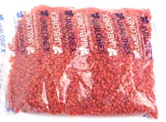 a bag of red beans sitting on top of a white table