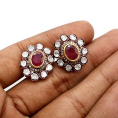 Natural Ruby & Polki Diamond Stud Earring, Engagement Earring, 925 Sterling Silver, Polki Jewelry, Polki Diamond Earring, Ruby Stud. Manufacture Country : India * Customization always available for Ring size, metal selection and any type of center stones changes, etc.... * If you want to make your own idea of Jewelry we can do it. Material : 925 Sterling Silver Gemstone : Ruby Secondary Gemstone : Polki, Pave Diamond Gemstone Color :   Gemstone Shape : As Seen In A Picture * Shipment will dispat Traditional 17 Jewel Diamond Earrings For Gift, Traditional Sterling Silver Diamond Earrings With Rose Cut, Hand Set Sterling Silver Bridal Earrings Gift, Sterling Silver Oval Earrings Hand Set, Hand Set Oval Sterling Silver Earrings, Hand-set Oval Sterling Silver Earrings, Oval Sterling Silver Earrings With Rose Cut Diamonds, Sterling Silver Bridal Earrings With Rose Cut Diamonds, Oval Rose Cut Diamond Earrings In Sterling Silver