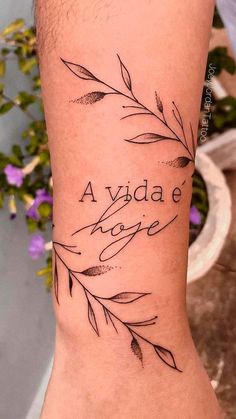 a woman's foot with a tattoo that reads, aydade love