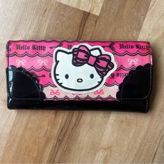 From 2011, Never Used, Clean Inside. Hello Kitty Written In Old English. This Is Her Rock Phase Let Me Know If You Have Any Questions Cute Pink Wallets For Daily Use, Kawaii Pink Wallet, Cute Black Wallet For Daily Use, Hello Kitty Wallet, Sanrio Bags, Sanrio Bag, Hello Kitty Shoes, Kitty Items, Kitty Stuff