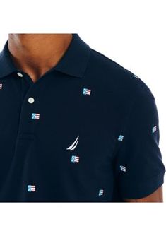 Made from Sustainably Crafted, moisture-wicking fabric to keep you dry all day, this printed polo has all the details you love: a classic fit, a two-button placket, and Nautica's J-class icon at the chest. Two-button placket. Spread ribbed collar. Short sleeves. Ribbed cuffs. J-class icon at chest. Vented hem. Classic fit. Moisture-wicking fabric keeps you dry for all-day comfort. From the Sustainably Crafted collection. | Nautica Men's Sustainably Crafted Classic Fit Printed Polo Shirt, Navy Blue, X-Large