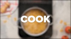 the word cook written in white over an image of food