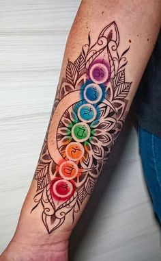 a person with a colorful tattoo on their arm