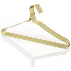 a gold metal hanger on a white background