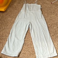 Nwt Old Navy Size Large Light Blue Jumpsuit- Button Details And Two Side Pockets With Adjustable Straps - Smoke Free Home Denim Overall Jumpsuit With Buttons For Summer, Summer Denim Overalls Jumpsuit With Buttons, Summer Denim Overalls With Buttons, Light Wash Button-up Jumpsuit Or Romper, Summer Wide Leg Jumpsuit With Button Closure, Button-up Cotton Denim Jumpsuit, Button-up Overalls With Pockets For Summer, Blue Denim Jumpsuit With Buttons, Spring Overalls With Bib Front And Buttons