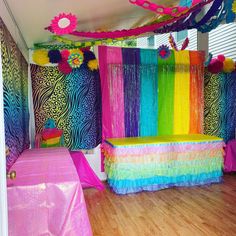 a room decorated in bright colors and decorations